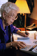 Joyce with her calculator